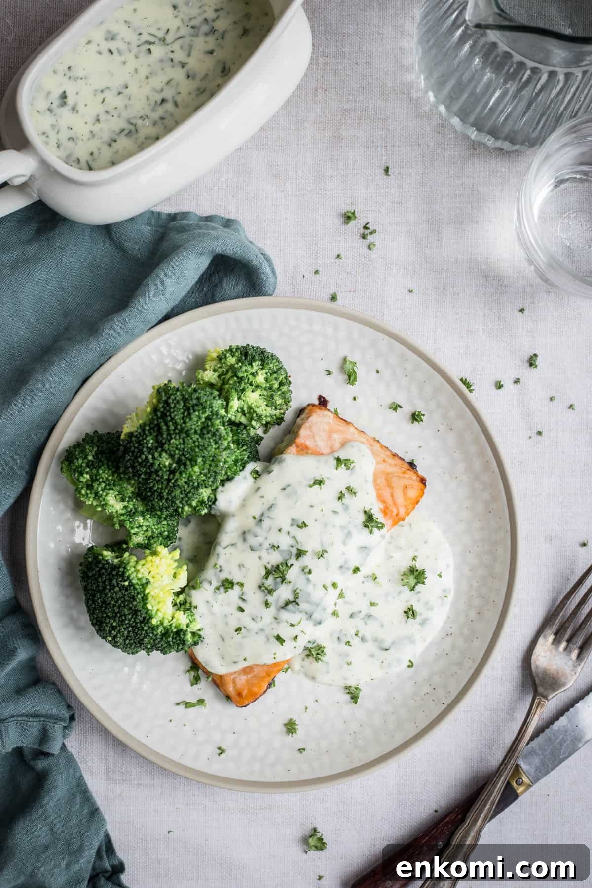 Creamy Gluten-Free Parsley Sauce Recipe 7 Parsley sauce drizzled over salmon and broccoli on a plate