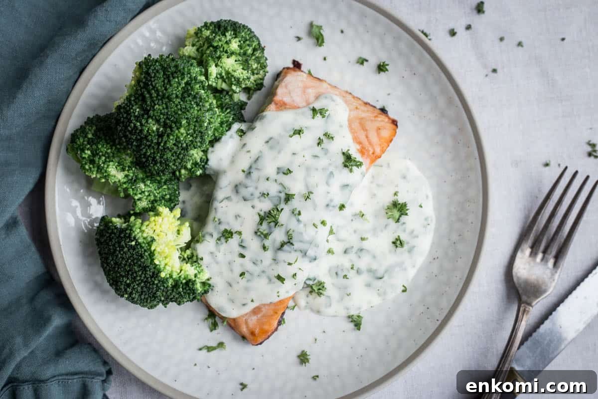 Creamy Gluten-Free Parsley Sauce Recipe 8 Parsley sauce drizzled over salmon and broccoli on a plate