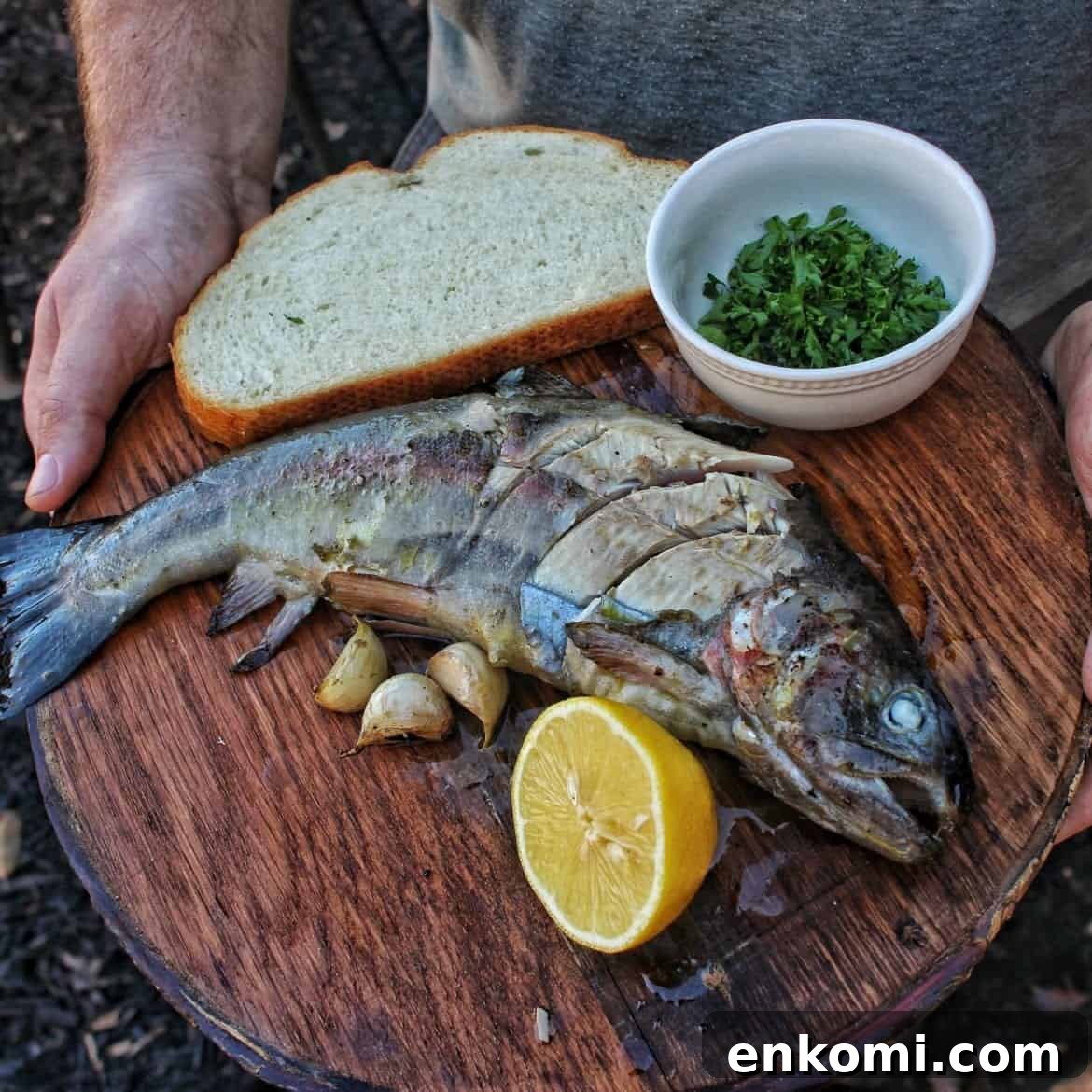 Trout in a Cast-Iron Skillet with Lemon and Herbs 3 cast iron trout ready to eat