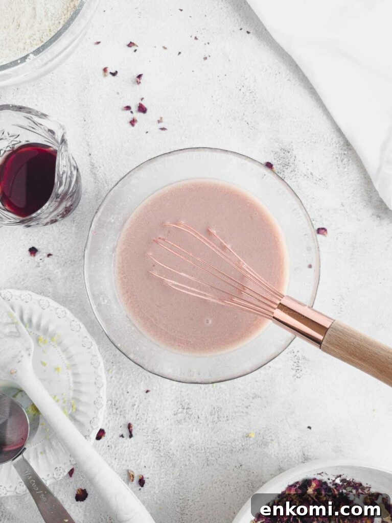 Vegan Rose Loaf Cake with Silky Petal Glaze 8 mixing together the wet ingredients