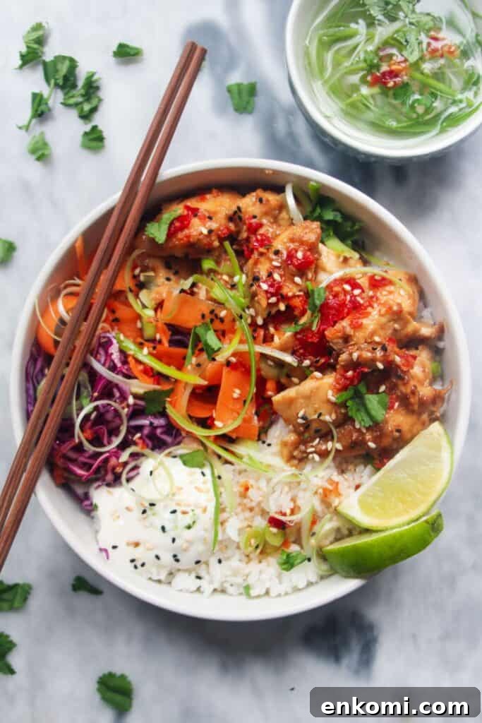20-Minute Marry Me Chicken with Creamy Sun-Dried Tomato Sauce 12 Grilled chicken poke bowl on a grey marble background.