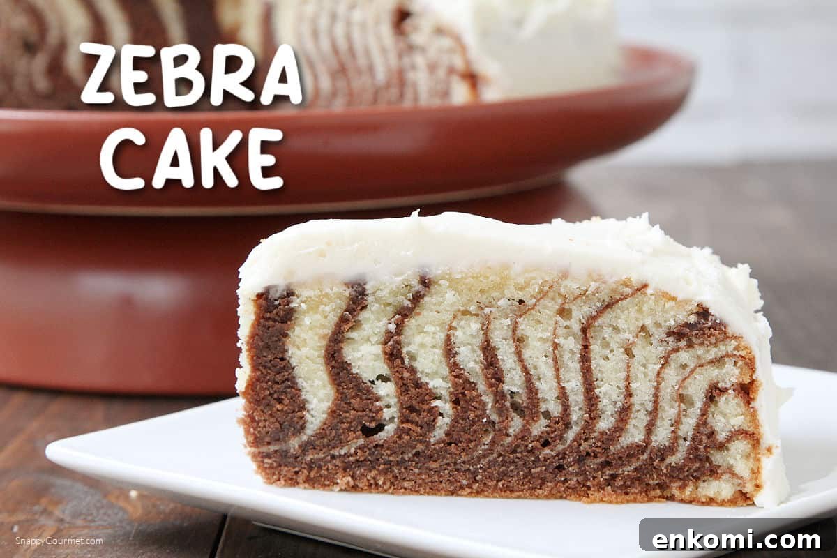 Zebra Cake slice on Zebra Cake on plate