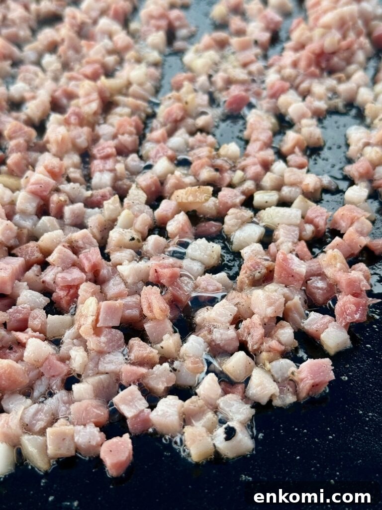 Grilled Mediterranean Breakfast Sandwiches on a Blackstone 3 pancetta cooking on griddle