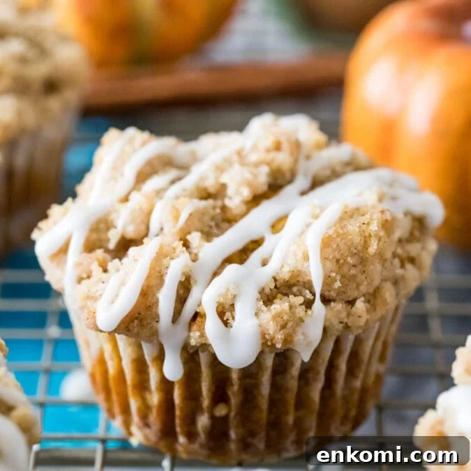 30 Muffin Recipes: Sweet, Savory & Seasonal Ideas 7 pumpkin muffin topped with streusel and vanilla glaze