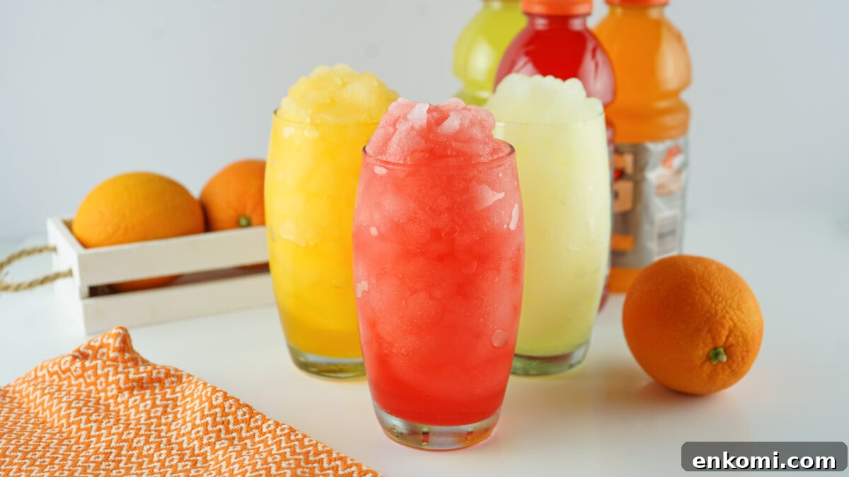 Gatorade Slushie Recipe: 3 Ingredients for Icy Drinks 3 colorful gatorade slushies lined up on white table