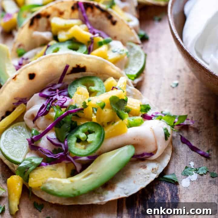 street tacos filled with chili lime coconut meat avocado and pineapple