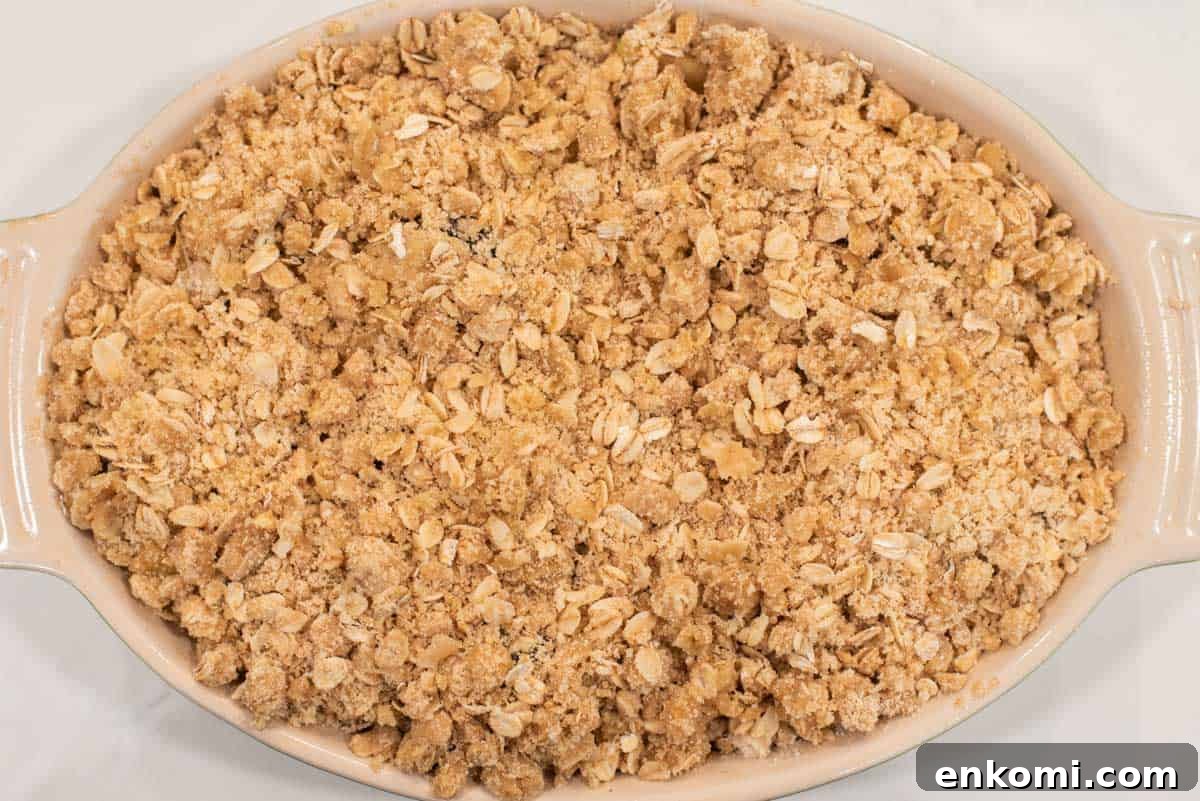 Apple and Blackberry Crumble Recipe for Summer Desserts 8 Crumble topping added to apple blackberry crumble.